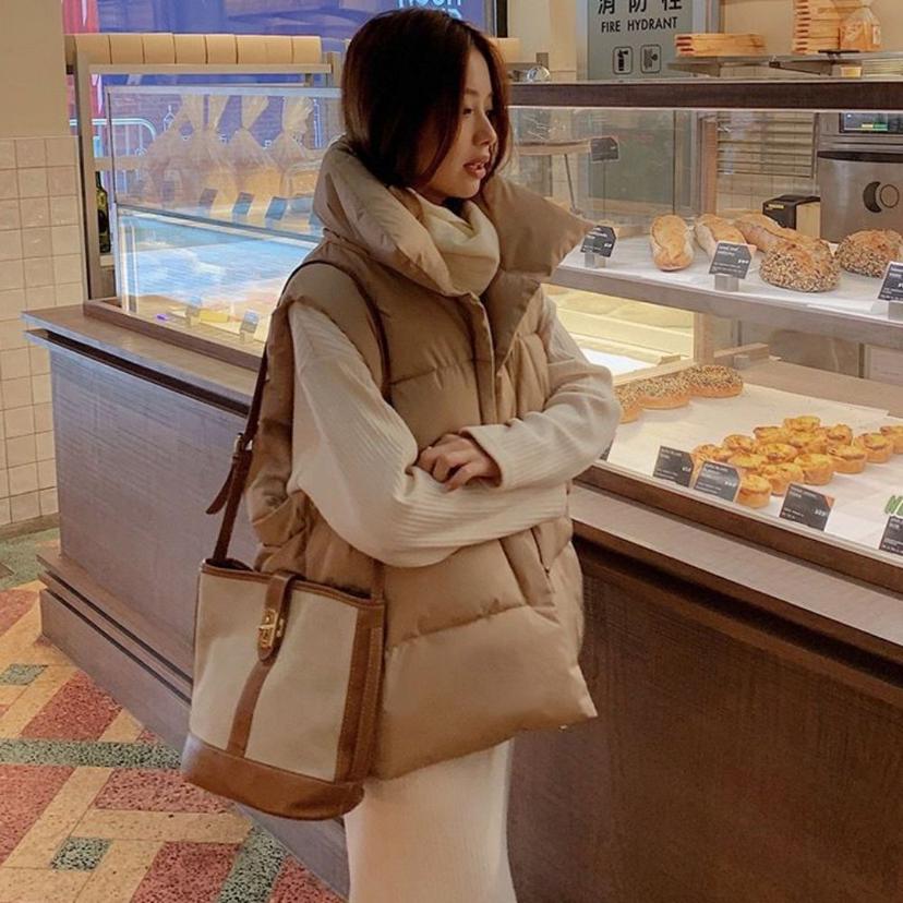 여성 사선 조끼 패딩 오버핏 패딩 베스트 겨울 아우터